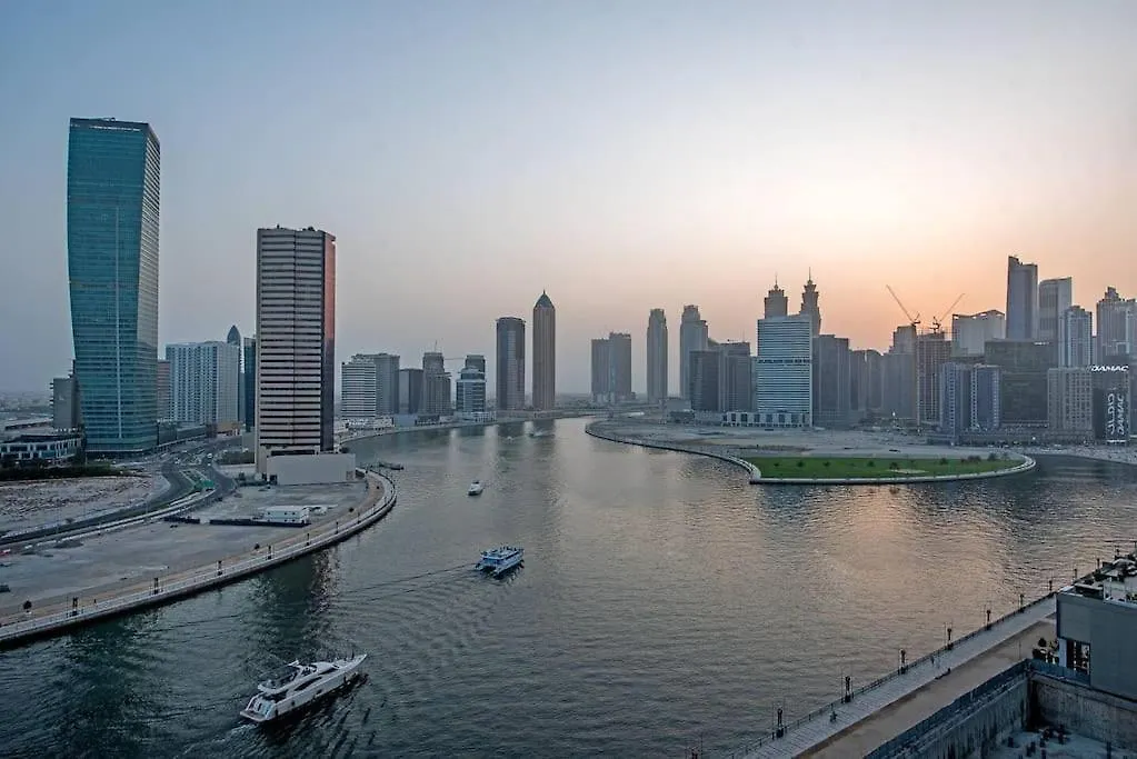 Chic Studio With Balcony - Canal Bay & Pool Views Dubai Apartment